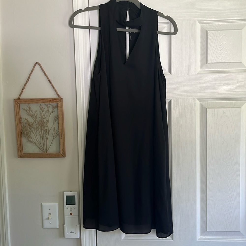 Black Dress With Neckline Cut